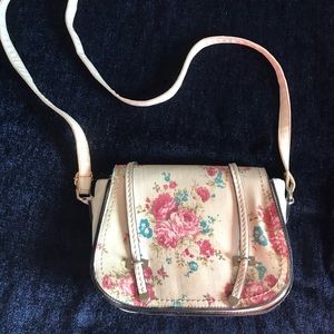 white leather and floral purse